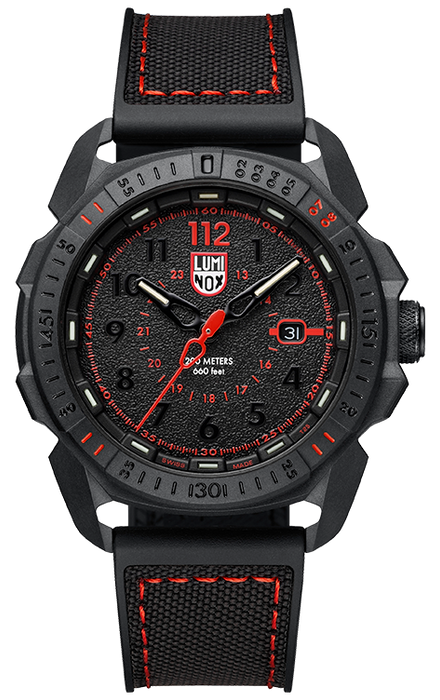 The black textured rubber strap with red stitching attaches to an intimidating geometric and black dial with small black second numerals and markers. The red accents draw your attention to whats important for precision timekeeping such as the second hand and inner dial.