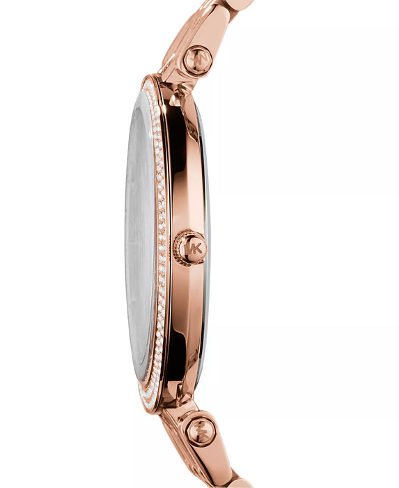 Ladies Darci Rose tone mk3192. Cz's around the dial of the watch, markers at each hour, adorned with hour, minute and second hand.  39mm case, band width measures at 17mm.
