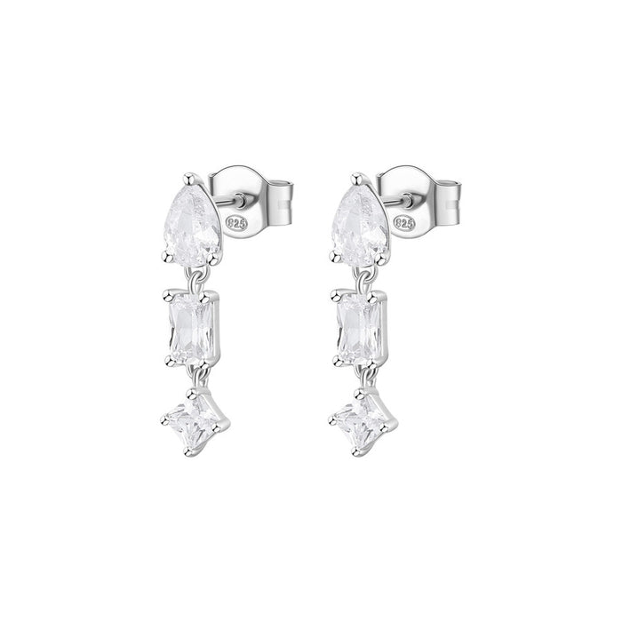 Pair of silver earrings with clear gemstones on a white background
