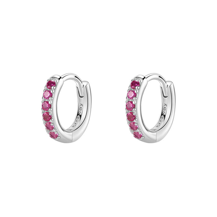 Silver hoop earrings with pink gemstones on a white background