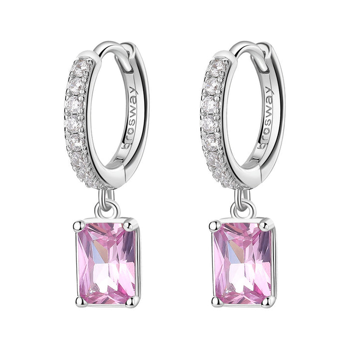 Silver hoop earrings with pink gemstones on a white background