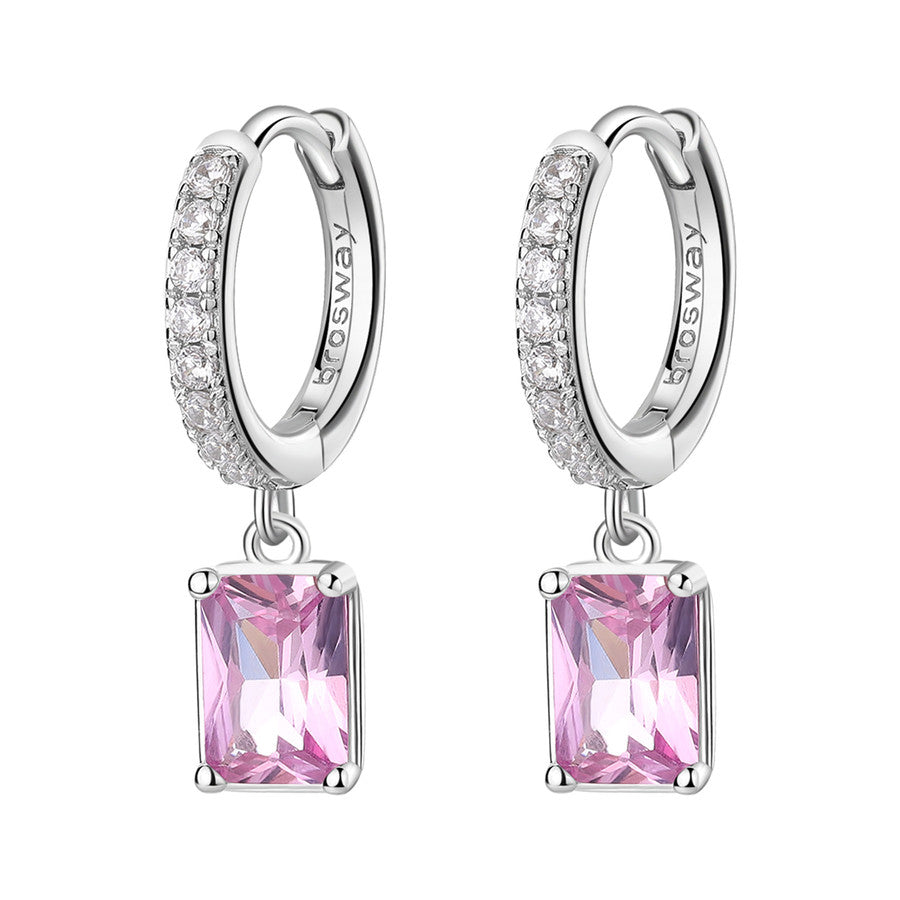 Silver hoop earrings with pink gemstones on a white background