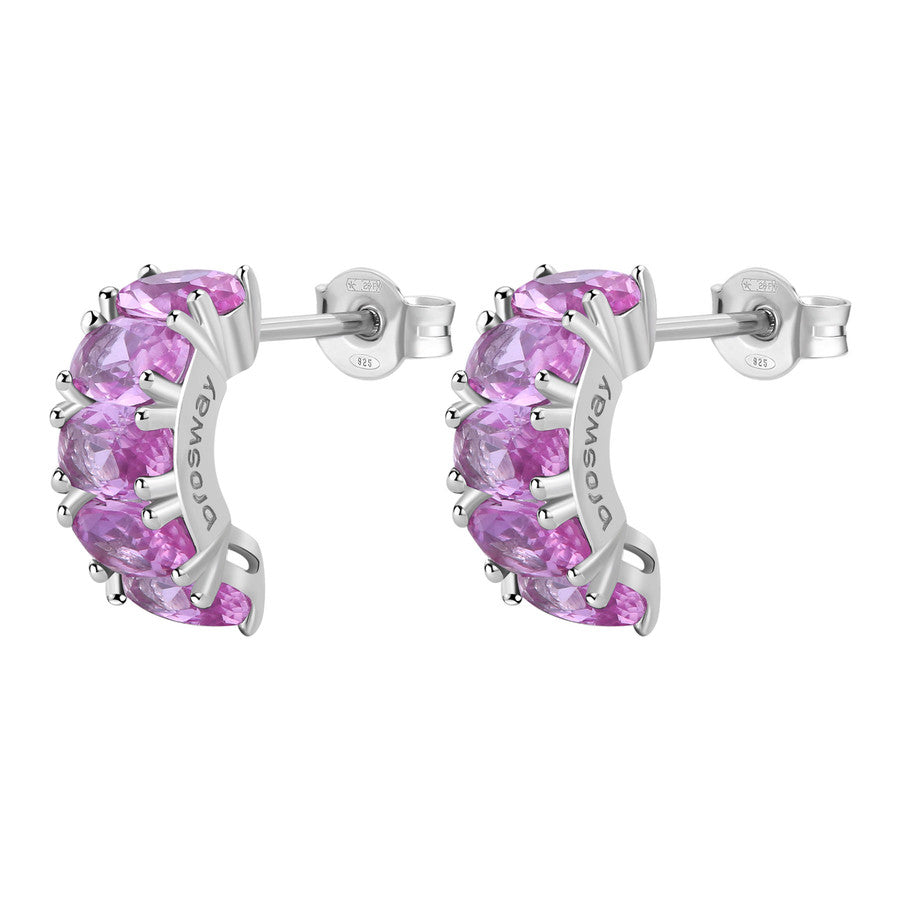 Silver hoop earrings with pink gemstones on a white background