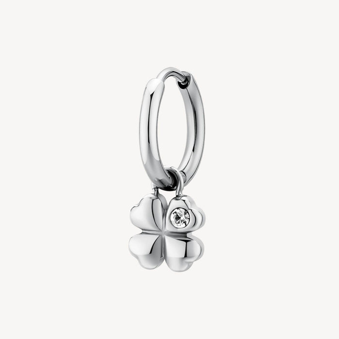 Silver four-leaf clover charm on a white background