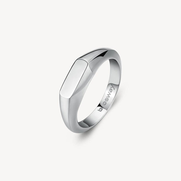 Silver ring with 'FREYRS' engraving on a white background