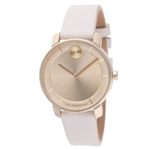 Gold watch with white strap on a white background