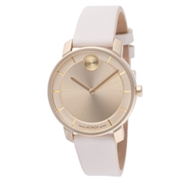 Gold watch with white strap on a white background