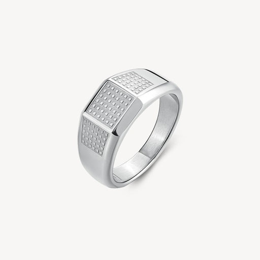 Silver ring with textured surface on a white background