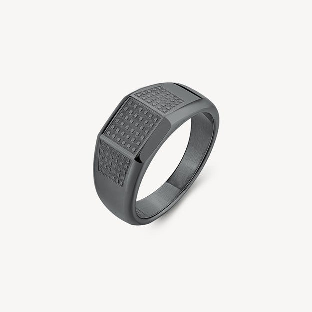 Gray ring with textured surface on a white background