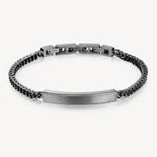 Silver bracelet with a black beaded band on a white background