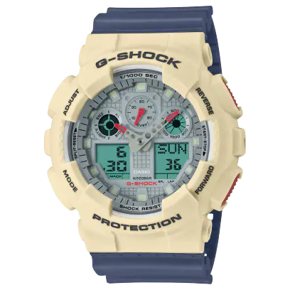 mens g-shock analog digital model. cream colored dial and navy blue rubber band. analog time telling light gray hands with red tips. double digital sub dials on the left and right side of the watch face placed at the four and eight o'clock markers. 
