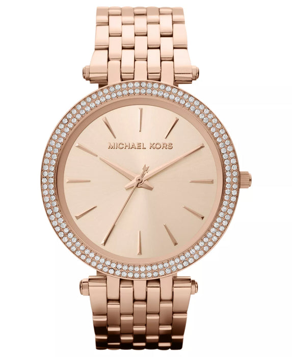 Ladies Darci Rose tone mk3192. Cz's around the dial of the watch, markers at each hour, adorned with hour, minute and second hand.  39mm case, band width measures at 17mm.