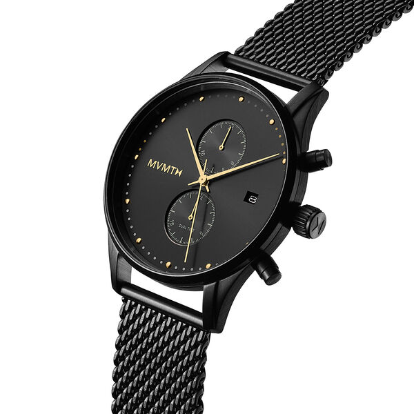Men's MVMT Voyager Tundra, accented with gold markers, hour, minute and second hands on a balck dial. Dual chronographs with active time keeping features and a date wheel placed at the three o'clock marker. This watch casing sits between a black mesh stainless steel strap perfect for intricate sizing. 