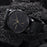 Men's MVMT Voyager Tundra, accented with gold markers, hour, minute and second hands on a balck dial. Dual chronographs with active time keeping features and a date wheel placed at the three o'clock marker. This watch casing sits between a black mesh stainless steel strap perfect for intricate sizing. 
