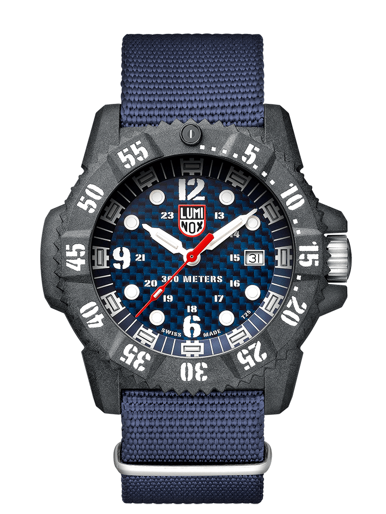 This is a unique watch that is casual and commanding of attention simultaneously. The navy blue strap is a flexible material that accents the textured blue dial very well. The second and hour numerals are very visible against the dark background as well as the bright white hands. The day date is also featured.