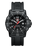 The black rubber strap has a tire track detail that continues into the textured outer part of the case. Each second is at least marked or has a numeral assigned to it and the hour numerals are a dark gray against the black face. The red second hand really pops against the dark aesthetic.