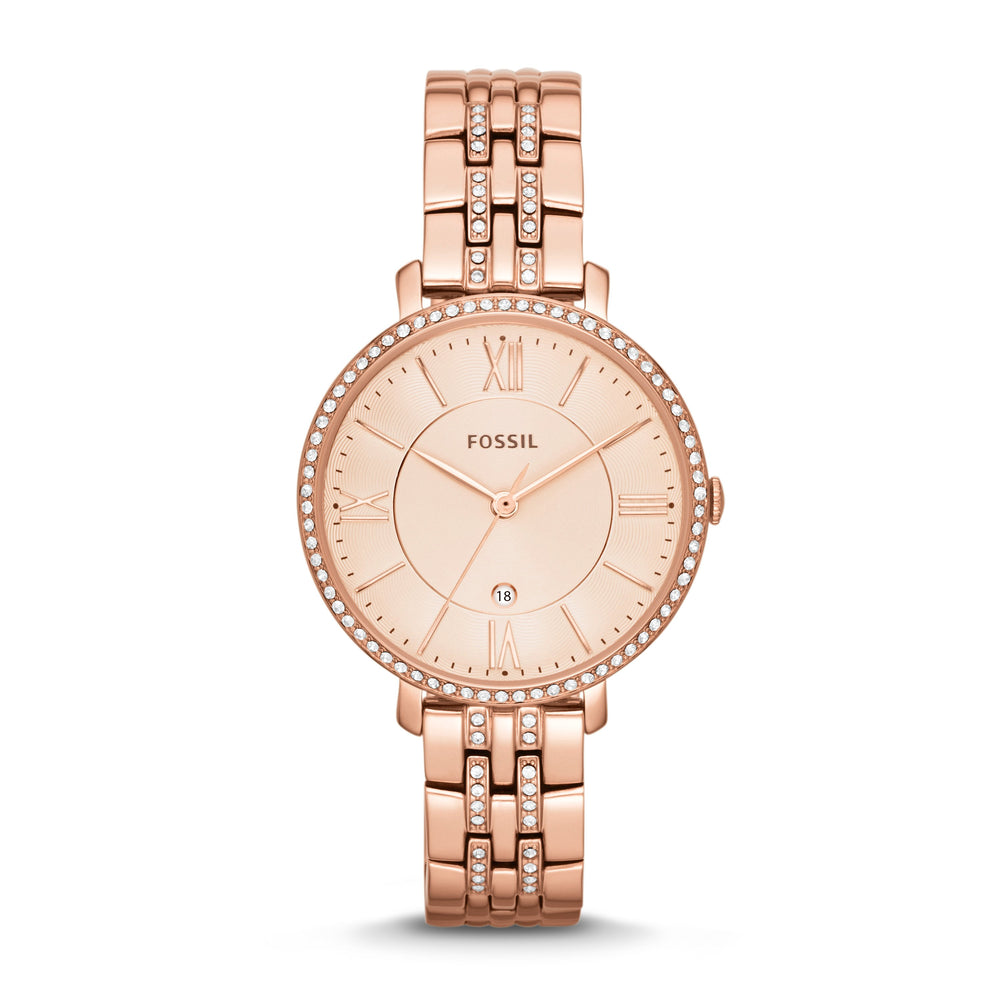 Rose gold-plated stainless steel case with a rose gold-plated stainless steel bracelet set with crystals. Fixed rose gold-plated bezel set with crystals. Rose dial with rose gold-tone hands and index hour markers. Roman numerals mark the 3, 6, 9 and 12 o'clock positions. Minute markers around the outer rim. Dial Type: Analog. Date display above the 6 o'clock position.