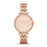 Rose gold-plated stainless steel case with a rose gold-plated stainless steel bracelet set with crystals. Fixed rose gold-plated bezel set with crystals. Rose dial with rose gold-tone hands and index hour markers. Roman numerals mark the 3, 6, 9 and 12 o'clock positions. Minute markers around the outer rim. Dial Type: Analog. Date display above the 6 o'clock position.
