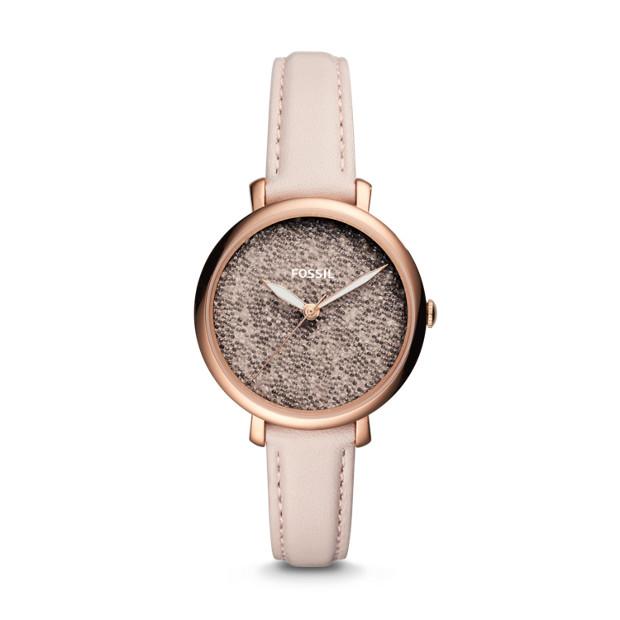 This timepiece embodies youthful exuberance with the slim light pink leather strap and rose gold case. The face is light pink and textured to look like sprinkles! The white hands make for easy readability while maintaining the dainty aesthetic of the watch.