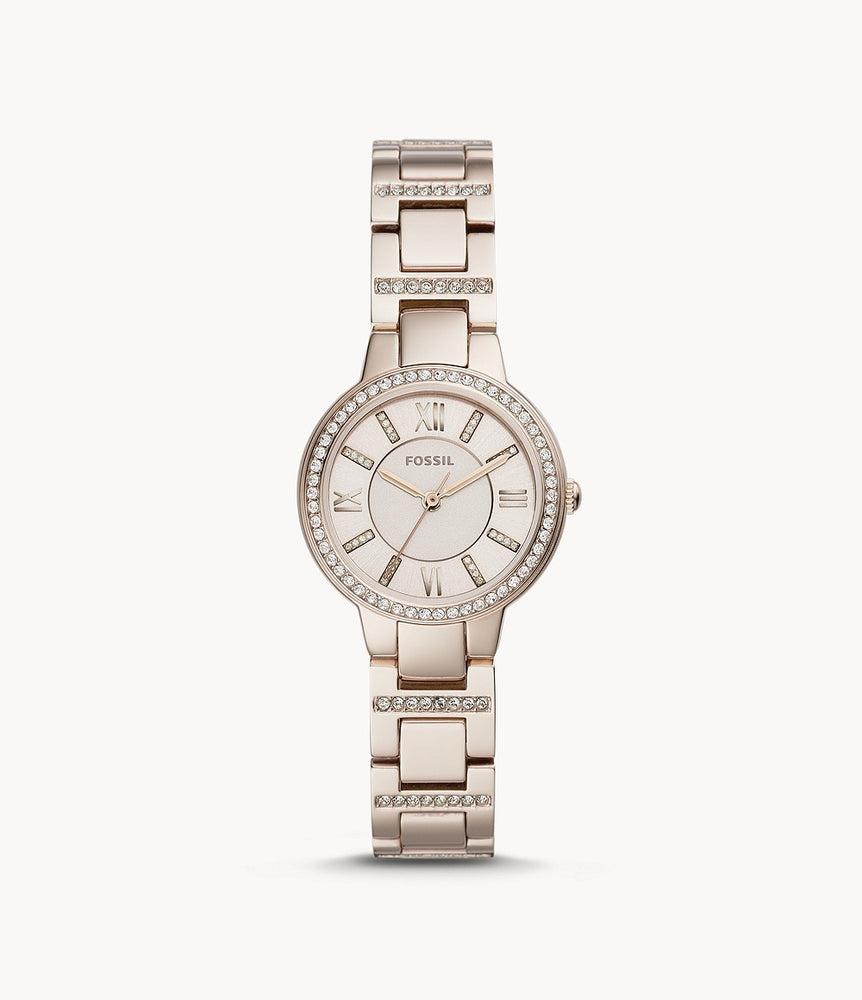 This timepiece is youthful and elegant. The pink blush stainless steel link bracelet adorned with lines of crystals attaches to the crystal lined matching pink bezel that frames a watch face of the same aesthetic. The light pink dial is adorned with crystal hour markers and rosy Roman numerals and hands.