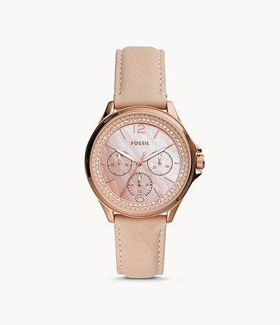 This delicate piece is blush and rose gold. The light pink leather strap attaches to the metallic case and bezel that frames the opalescent dial. The monochrome aesthetic with differing finishes adds details that subtly demand attention on the wearer.