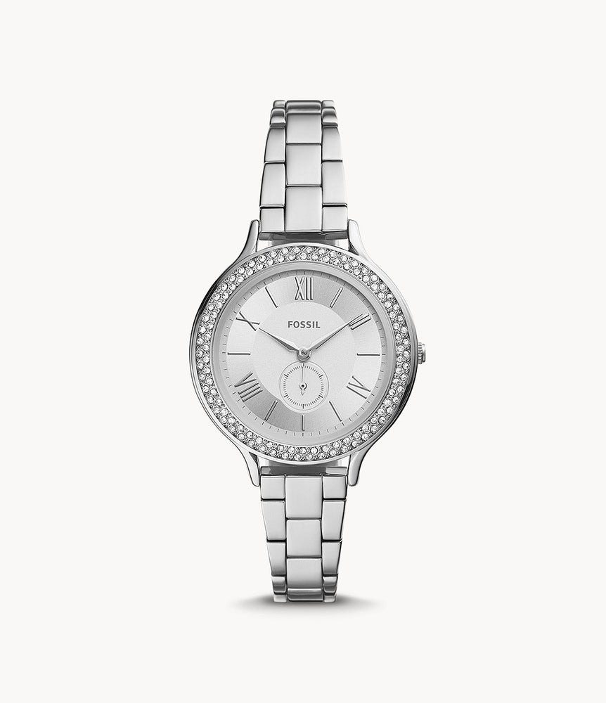 The silver tone stainless steel bracelet attaches to the matching case and crystal lined bezel. The silver tone face features slim silver Roman numerals and hands as well as a matching sub dial.