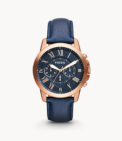 This watch features a navy blue and rose gold color scheme. The smooth blue leather band attaches the rose gold tone stainless steel case and bezel that frames the matte blue face with rose gold hour numerals, markers, and hands. The dimension created by the offset sub dials adds a subtle touch of style.
