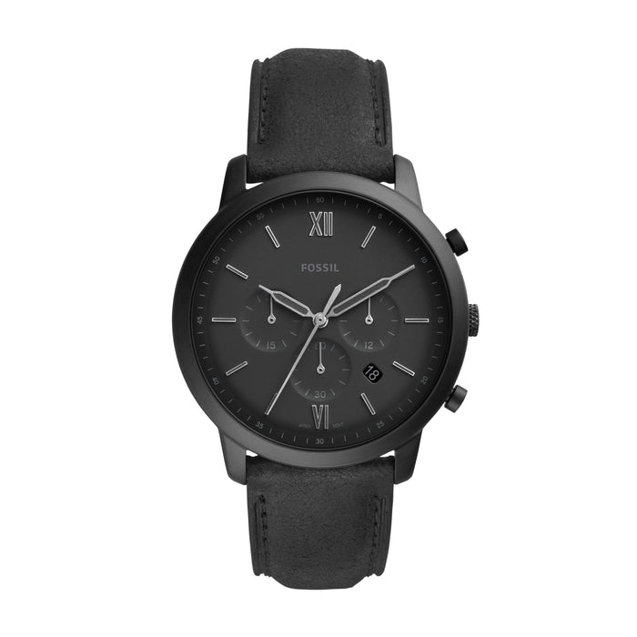 This all matte black timepiece features a black leather strap that connects to the fixed black bezel that frames the black face with 3 sub dials and white outlined hour markers and Roman numerals. The day date is also displayed.