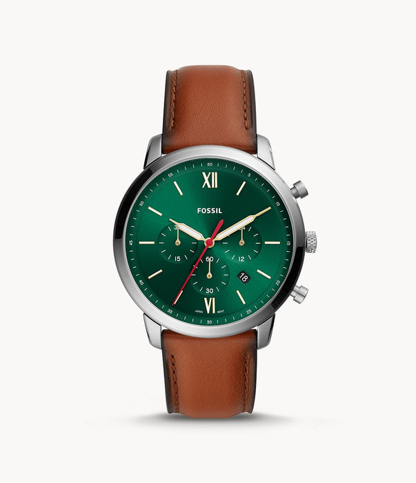 Stainless steel case with a luggage leather strap. Fixed stainless steel bezel. Green dial with luminous gold-tone hands and index hour markers. Roman numerals appear at the 6 and 12 o'clock positions. Arabic numeral minute markers (at 5 minute intervals). Minute markers around the outer rim. Dial Type: Analog. Luminescent hands. Date display between the 4 and 5 o'clock positions.