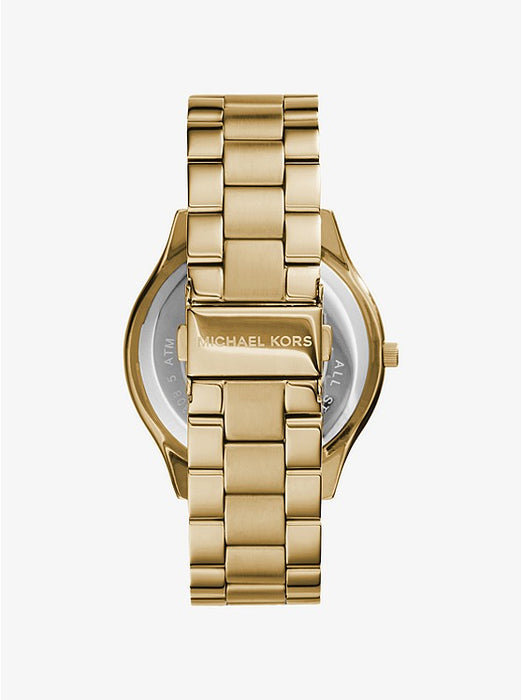 Ladies Michael Kors Slim Runway in a Gold tone stainless steel casing and bracelet. Chamoagne colored dial, markers at each hour. hour minute and second hand included, slim three piece bracelet.