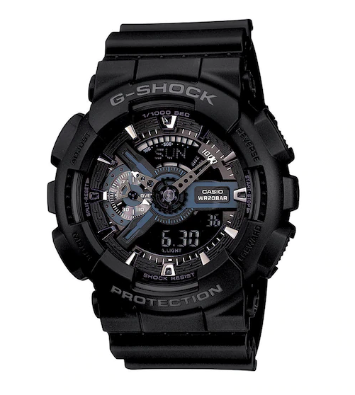 Mens Casio G-shock. Analog and digital time display, day/ date display, black rubber shock resistant material for comfort and functionality. Black dial, with silver accents.