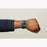 This Men's 47mm Shinola Runwell Chrongraph watch measures at 47mm with a case thickness of 12.3mm. White Numerical Markers are placed at all stations of the watch with a subdial at the 6 o'clock marker that works as a second hand. A black band is connected to this solid stainless steel case.
