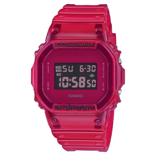 This watch features a translucent red resin band and case with a matching face that frames a rectangular digital time display as well as the day date. This simple design balances out the vibrant color for a quirky timepiece.