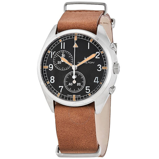 Featured is the Hamilton Khaki Aviation Pilot Pioneer Chrono Quartz with a brown leather band, true to the traditional aesthetic, a black face and large readable numbers in a silver case.