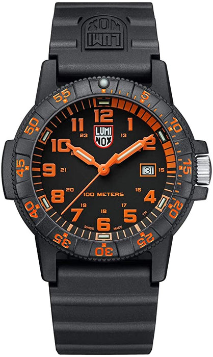 The nautical sea life theme of this watch is evident by the shape of this watch and the design of the band as well. The protected crown is like that of a turtle and the case is its shell, the small orange second numerals match the bold hour numerals and hands within the face of the watch. Overall an eye-catching color scheme with a timeless underlaying style. In darkness, the even hour markers and hands illuminate for maximum visibility.